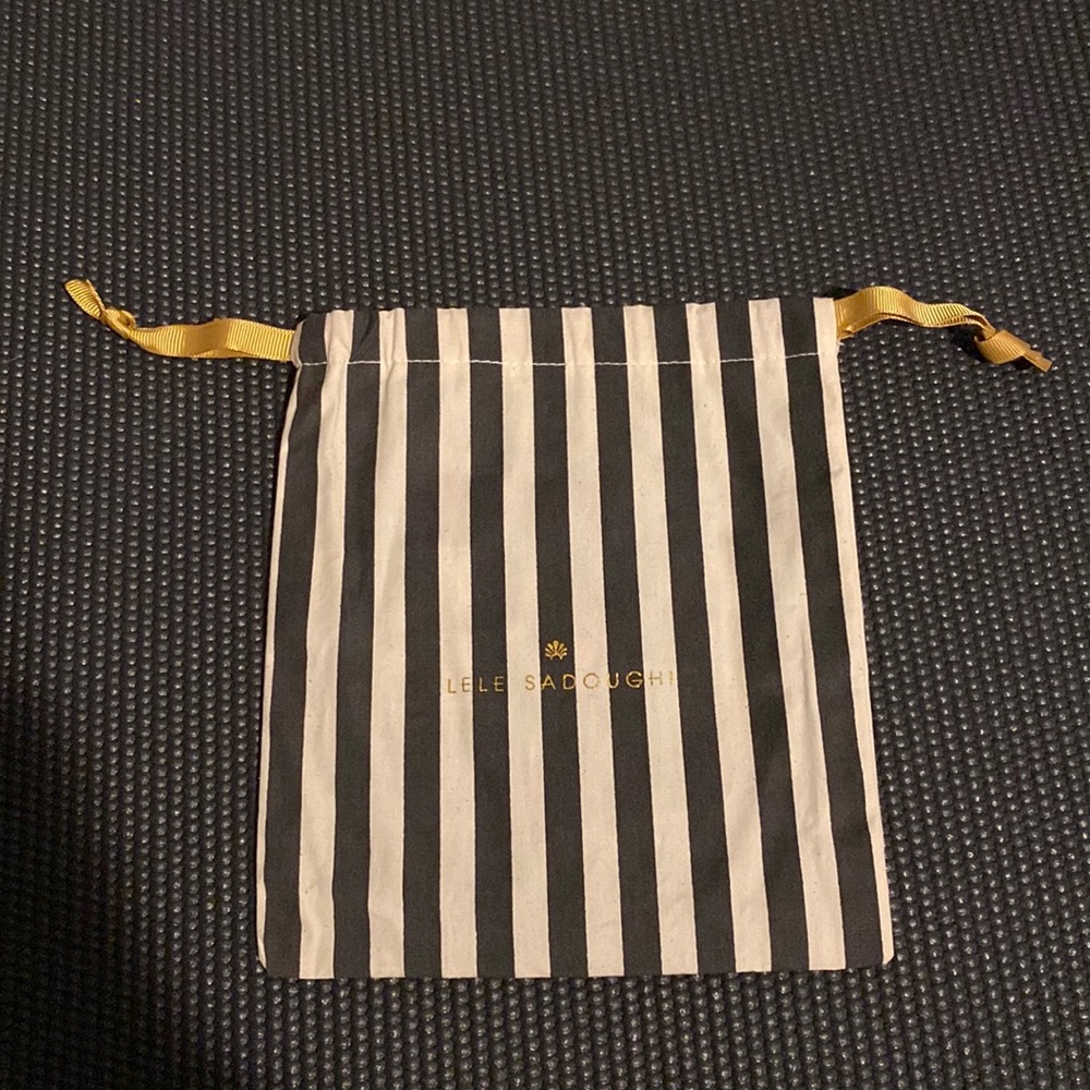 LeLe Sadoughi headband dust cover